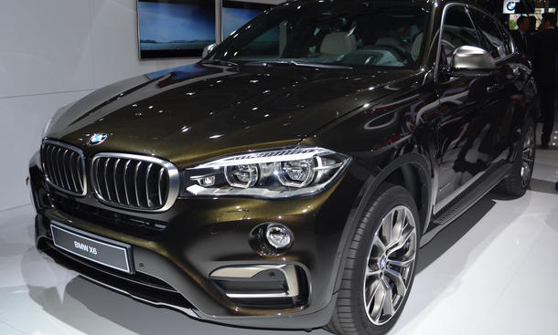 BMW X6 - Das erfolgreiche SUV-Coupé bekommt in Paris einen Nachfolger. Am Konzept ändern die Bayern nicht viel - warum auch? SUV-Neuheiten Rundgang Pariser Autosalon 2014 Geländewagen Bilder BMW X6 Volvo XC90 Kia Sorento Fiat 500X