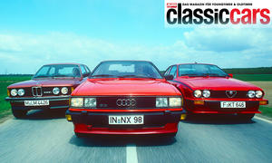 Der BMW 323i/Audi GT 5E/Alfa GTV 2.0 fahrend von vorne fotografiert. 