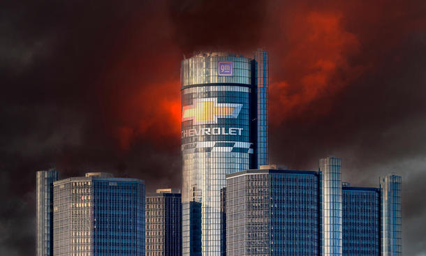 Eine in dunklen Farben gehaltene Kulisse von Hochhäusern, man sieht das Chevrolet Logo.