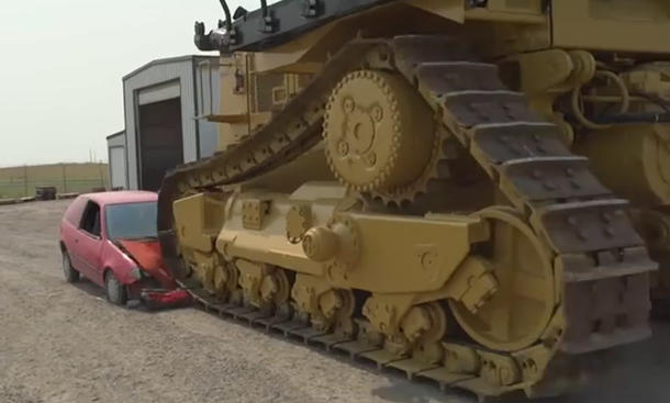 Caterpillar D11 vs. Pontiac Firefly: Video Caterpillar D11 vs. Pontiac Firefly: Video